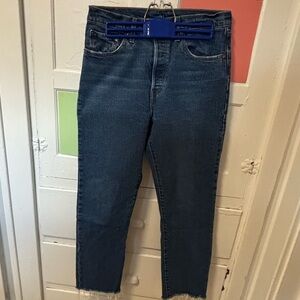 Levi 501 medium wash denim jeans